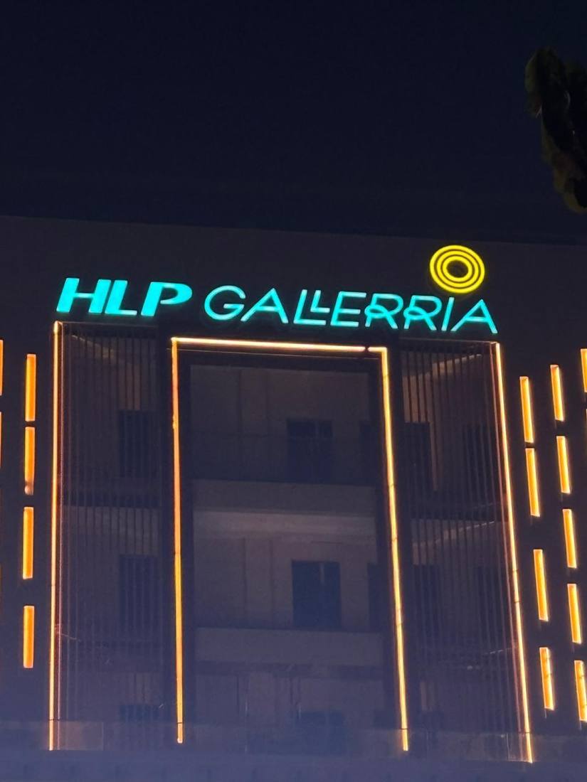 HLP Gallerria illuminated facade signage at night