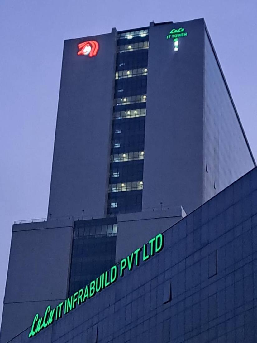 LuLu IT Tower rooftop LED signage at night