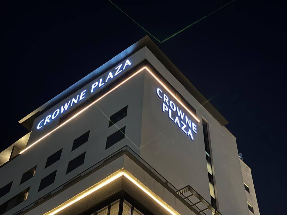 Radisson Resort and Spa Khopoli illuminated sign at night